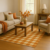 Rustic checkered rug in pumpkin orange and beige for kitchen or entryway.